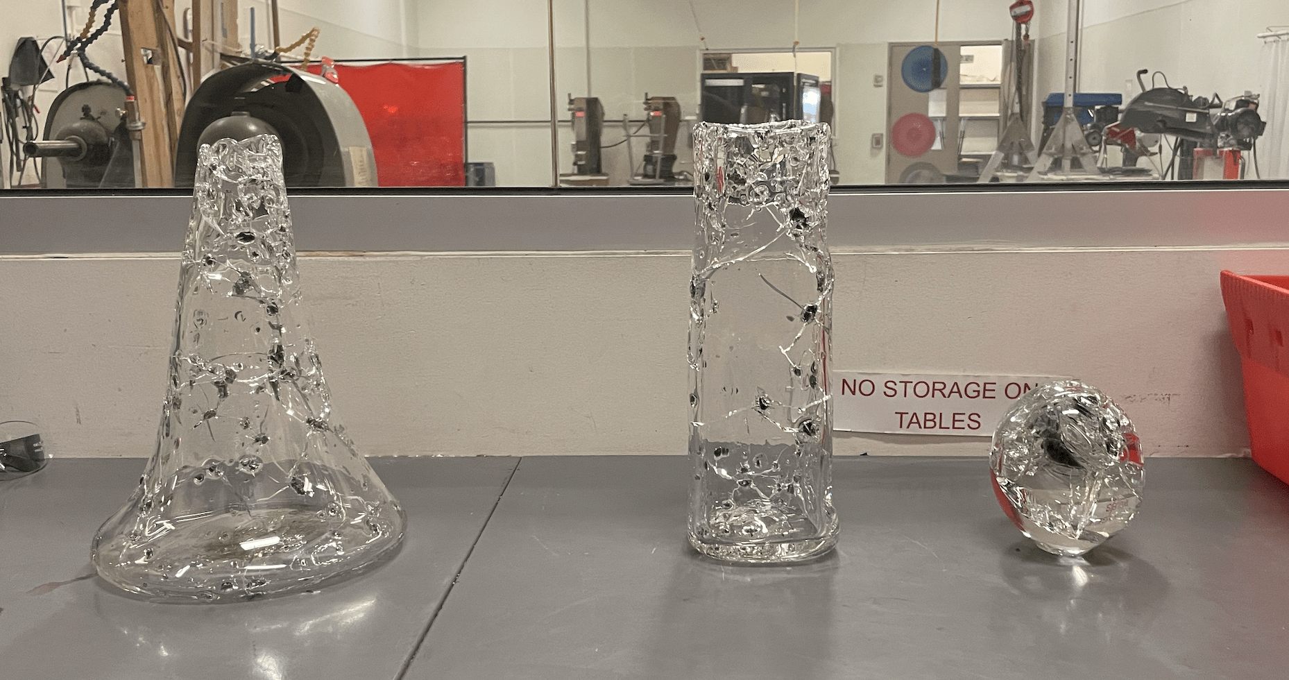 Hot blown glass with obsidian inclusions